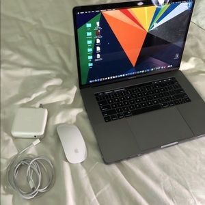 256 gb 15 inch Apple MacBook Pro w/ Touch Bar